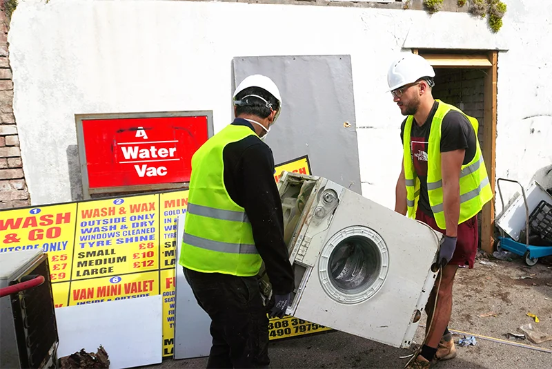 Bristol House Clearances removing a washing machine